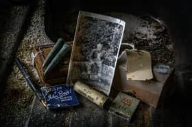 A forgotten photograph, matches, bullets and a shotgun cartridge left behind at an abandoned crofthouse at Benacheilt in Caithness. Photographer Angus Mackay said finding the image” put the hairs up on the back of my neck".
