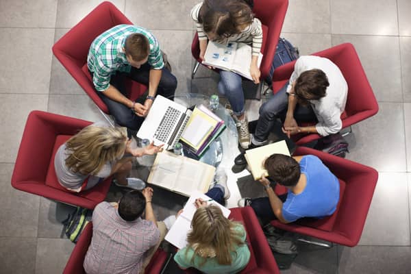 University students studying in a circle