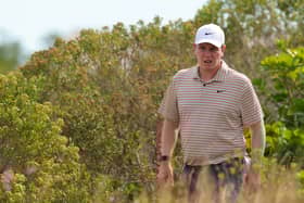 Bob MacIntyre looks for playing partner Sahith Theegala’s ball during the second round of the Hero World Challenge