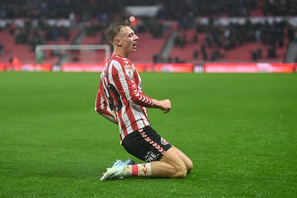 Tommy Watson celebrates his winning goal