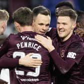 Hearts captain Lawrence Shankland surrounded by teammates after making it 2-0 over Dundee at Tynecastle. (Photo by Mark Scates / SNS Group)