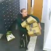 This is the moment a bold thief walks into a luxury apartment block and steals residents Amazon parcels.  
