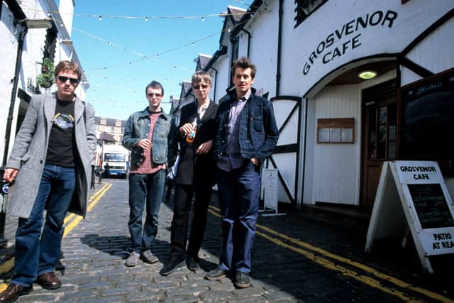 Travis group portrait in 1997