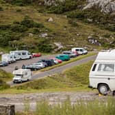 Campers and cars on the NC500 near Ullapool, one of the areas which could benefit from a £4m fund to protect communities and infrastructure from pressures caused by high visitor numbers. Picture taken in July 2020. 