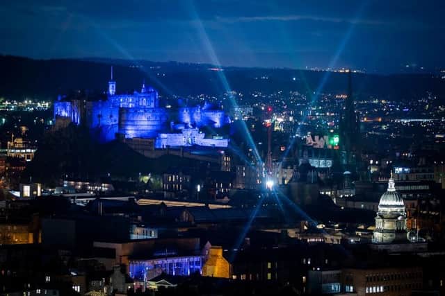 Edinburgh (seen here illuminated for St Andrews Day 2020) has a bright future, not just with technology and AI, according to Knight Frank, but with established industries like the financial services sector too.