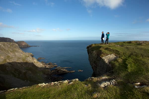 A Couple Birdwatching On The Mull Of Oa On The Isle Of Islay, Inner Hebrides Credit VisitScotland / Paul Tomkins
