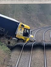 The lorry crashed into a railway line near Gretna after driving off a motorway