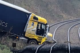 The lorry crashed into a railway line near Gretna after driving off a motorway