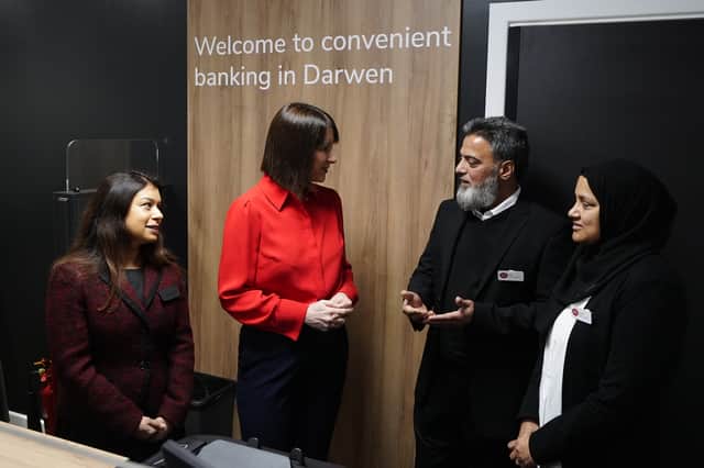 The Chancellor of the Exchequer Rachel Reeves speaks to the media about the Office for National Statistics GDP stats for October during a visit to the Darwen Banking Hub in Darwen, Lancashire.