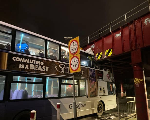 The bus stuck under the bridge on Cook Street, Glasgow