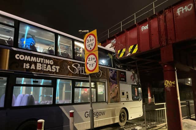 The bus stuck under the bridge on Cook Street, Glasgow