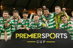 Celtic players celebrate after winning the Premier Sports Cup final following a penalty shoot-out against Rangers. (Photo by Craig Foy / SNS Group)