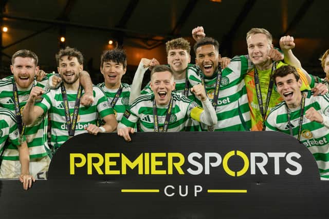 Celtic players celebrate after winning the Premier Sports Cup final following a penalty shoot-out against Rangers. (Photo by Craig Foy / SNS Group)