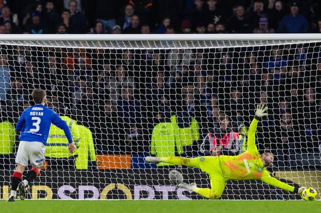 Celtic goalkeeper Kapser Schmeichel saves from Rangers' Ridvan Yilmaz in the Premier Sports Cup final penalty shootout. (Photo by Craig Williamson / SNS Group)