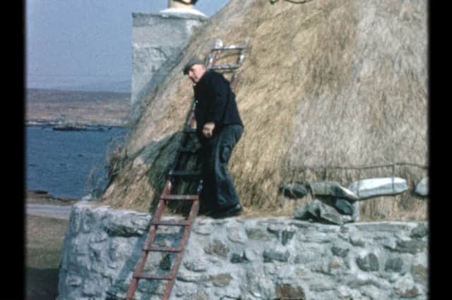 Thatching a roof. The working lives of islanders and their skills are well documented in the new archive. PIC: UistFilm.