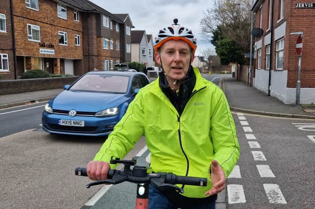 The Scotsman's Transport Correspondent Alastair Dalton on an e-scooter in Portsmouth on December 10