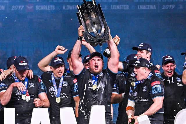 Zander Fagerson lifts the URC trophy after Glasgow's victory over Vodacom Bulls at Loftus Versfeld in June. (Photo by Anton Geyser/SNS Group)