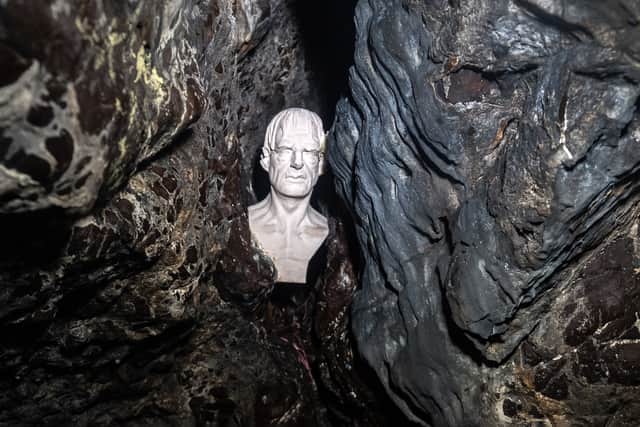 Peering out of the darkness, the Sawney Bean sculpture has been left by an anonymous artist. Picture: John Devlin
