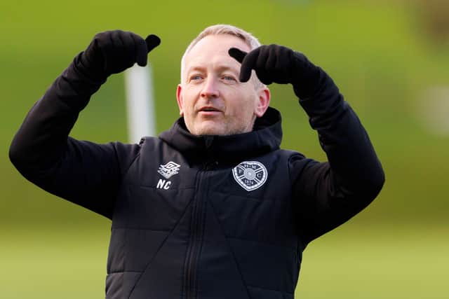 Hearts head coach Neil Critchley during a training session ahead of the UEFA Conference League match against Petrocub. (Photo by Mark Scates / SNS Group)