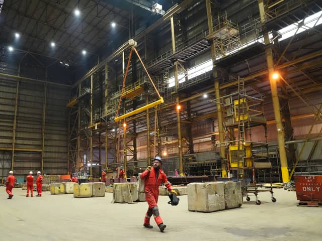 Workers in the hall of the Harland & Wolff construction yard in Methil, east Scotland