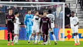 Hearts players are left dejected after Petrocub score to make it 2-2 at Tynecastle. (Photo by Ross Parker / SNS Group)