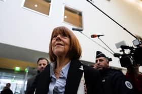 Gisele Pelicot, who was allegedly drugged by her now former husband so that he and others could assault her, arrives at the court house in Avignon, southern France, on Thursday