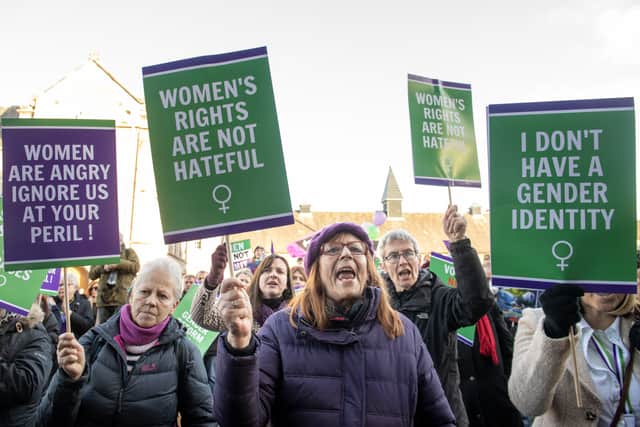 Supporters of For Women Scotland and the Scottish Feminist Network protest outside the Scottish Parliament (Picture: Lesley Martin)