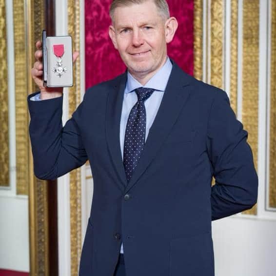 Stephen Gallacher shows off his MBE