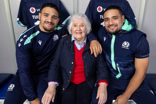 Brothers Sione, left, and Mosese Tuipulotu, right, with their grandmother Jaqueline Thomson. The pair will be up against each other when Glasgow play Edinburgh.