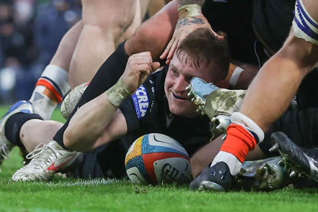 Glasgow Warriors' Johnny Matthews celebrates after scoring his second try of the game.