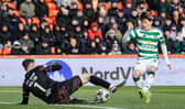 Celtic's Kyogo Furuhashi is closed down by Dundee United's Jack Walton. (Photo by Craig Foy / SNS Group)