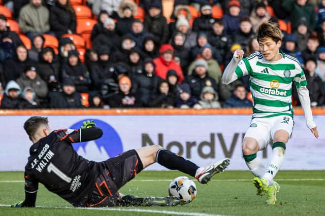 Celtic's Kyogo Furuhashi is closed down by Dundee United's Jack Walton. (Photo by Craig Foy / SNS Group)