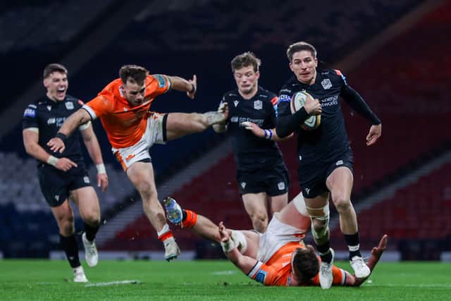 Glasgow Warriors' Sebastian Cancelliere on the attack against Edinburgh at Hampden.