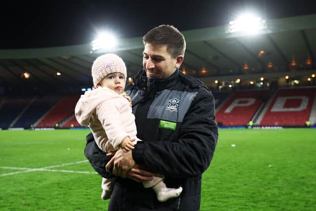 Glasgow Warriors winger Sebastian Cancelliere with his daughter Joaquina Maria after the win over Edinburgh at Hampden.