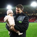 Glasgow Warriors winger Sebastian Cancelliere with his daughter Joaquina Maria after the win over Edinburgh at Hampden.