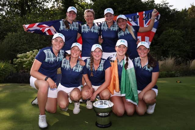 Captain Catriona Matthew celebrates with her players after Great Britain & Ireland’s win in the Curtis Cup at Sunningdale
