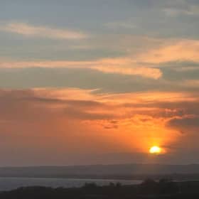 Sun sets over Montrose, Angus, on the shortest day. The mild conditions are set to continue over Christmas with 14 degrees Celsius due in parts of the North East on Tuesday. 