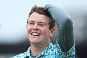 Bob MacIntyre celebrates winning the Genesis Scottish Open at The Renaissance Club