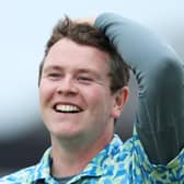 Bob MacIntyre celebrates winning the Genesis Scottish Open at The Renaissance Club