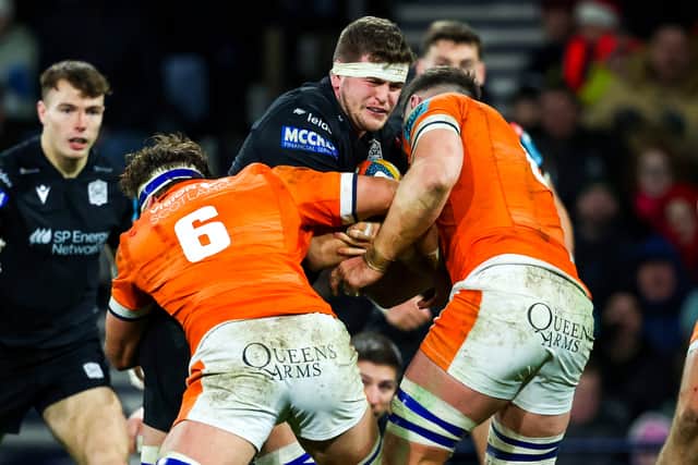 Scott Cummings tries to break through the Edinburgh defence at Hampden.