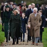  King Charles III and Queen Camilla followed by (second row, left to right) the Princess of Wales, Princess Charlotte, the Prince of Wales and Prince George attending the Christmas Day morning church service at St Mary Magdalene Church in Sandringham. PIC: Aaron Chown/PA Wire