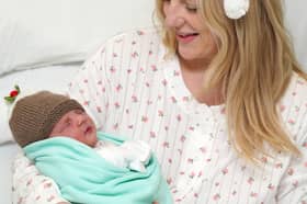 Anne-Marie Hunt, from Livingston, with her baby daughter who was born at 5.16am on Christmas Day morning at St John's Hospital, Livingston, weighing 6lbs 7oz. Dad Gordon Wilson is also doing well. PIC: Jane Barlow/PA Wire