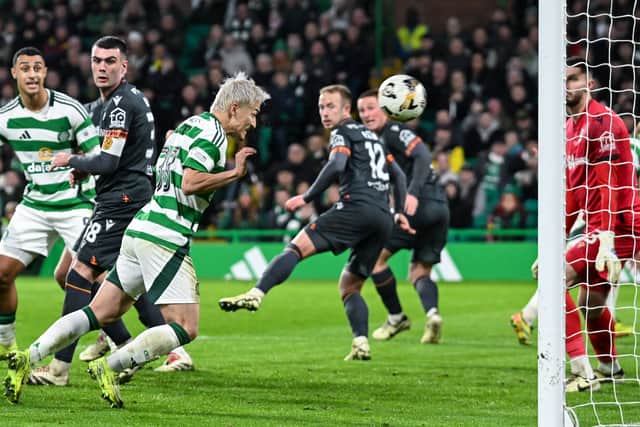 Celtic's Daizen Maeda scores to make it 2-0 over Motherwell. (Photo by Rob Casey / SNS Group)