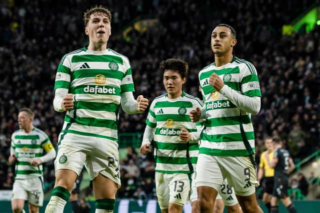 Celtic's Arne Engels (L) celebrates scoring a penalty to make it 1-0 over Motherwell. (Photo by Craig Foy / SNS Group)