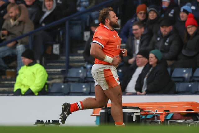 Edinburgh's Pierre Schoeman walks off after being shown a yellow card against Glasgow Warriors at Hampden Park.