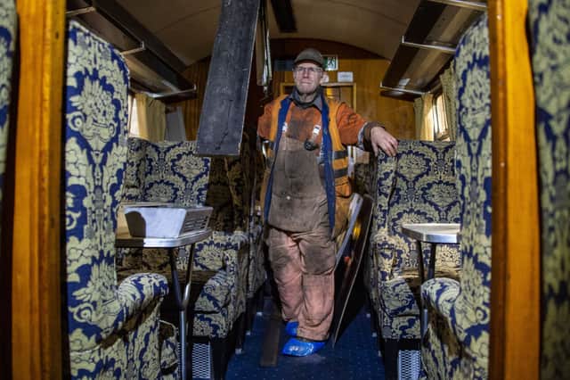 Carriage restorer Jim Ormiston, who has been an SRPS member for 45 years, working on a 1950s coach