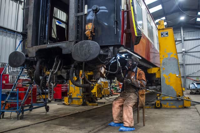 Jim Ormiston working on upgrading one of the SRPS's 1950s carriages in Bo'ness