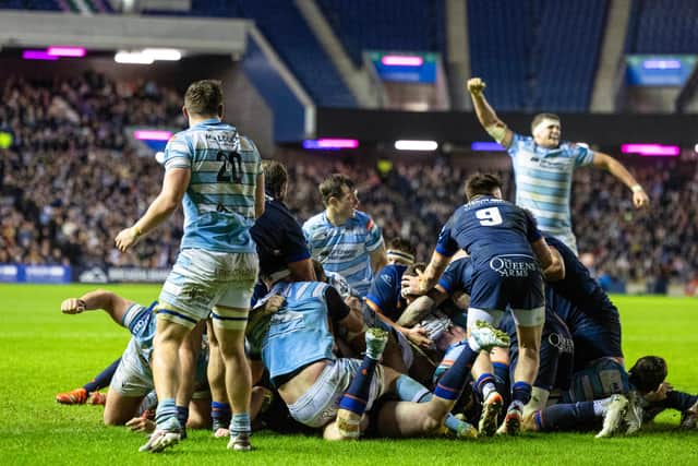 Scott Cummings, right, celebrates Glasgow Warriors' penalty try. Edinburgh responded with a try of their own almost immediately.