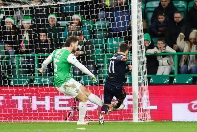 Kilmarnock's Danny Armstrong was sent off for a second booking after this challenge on Hibs' Jack Iredale.