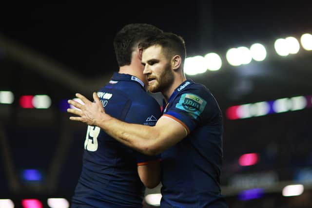 Edinburgh's Marshall Sykes and Matt Currie during the match against Glasgow Warriors.